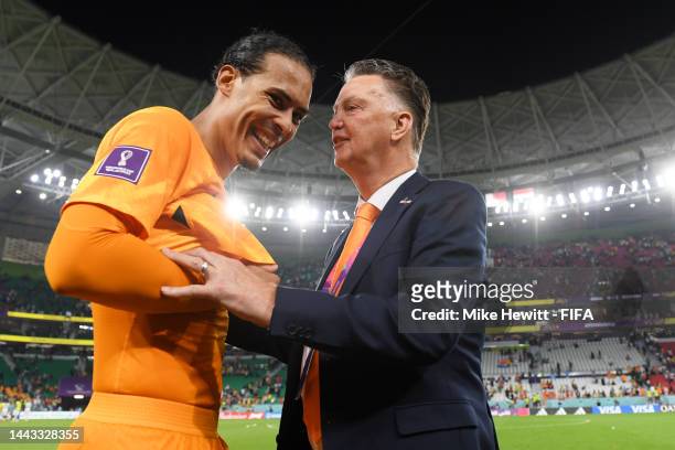 Louis van Gaal celebrates with Virgil Van Dijk of Netherlands after their sides victory during the FIFA World Cup Qatar 2022 Group A match between...