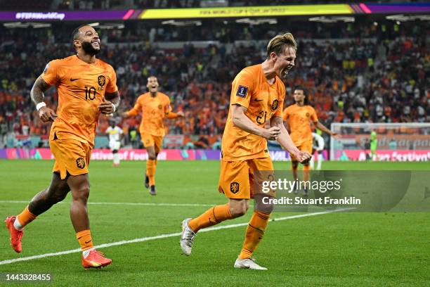 Memphis Depay and Frenkie de Jong of Netherlands celebrate their team's second goal by Davy Klaassen during the FIFA World Cup Qatar 2022 Group A...