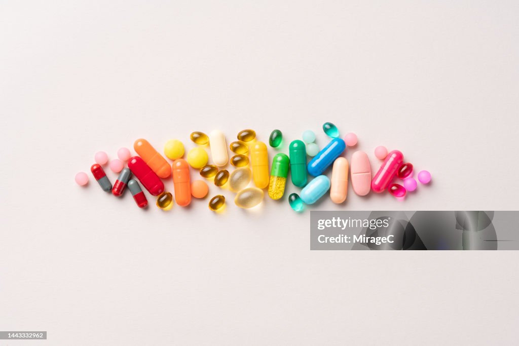 Multi Colored Medical Pills Organized in a Row