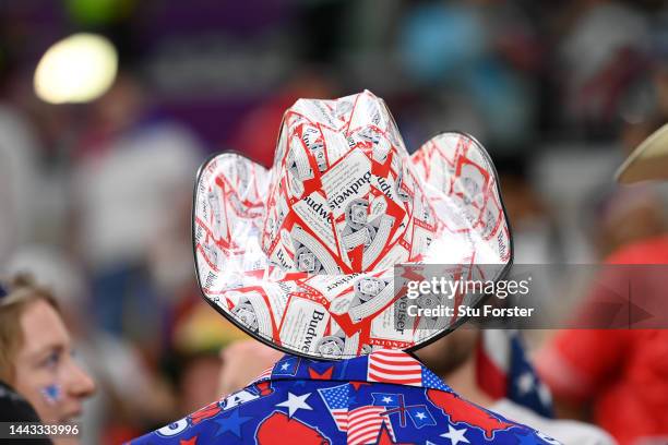 Fan wearing a Budweiser hat is seen prior to the FIFA World Cup Qatar 2022 Group B match between USA and Wales at Ahmad Bin Ali Stadium on November...