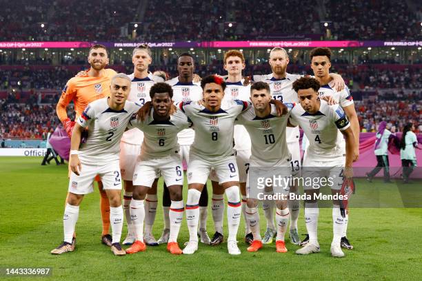 United States players line up for a team photo during the FIFA World Cup Qatar 2022 Group B match between USA and Wales at Ahmad Bin Ali Stadium on...
