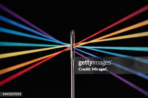 Rainbow Colored Threads Converge Through Needle Eyelet High-Res Stock ...