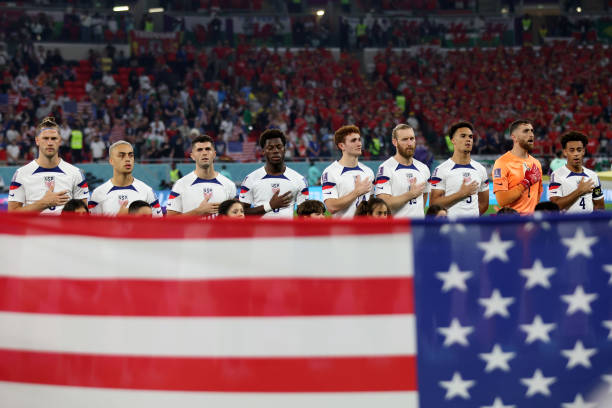 United States players sings their national anthem prior to the FIFA World Cup Qatar 2022 Group B match between USA and Wales at Ahmad Bin Ali Stadium...