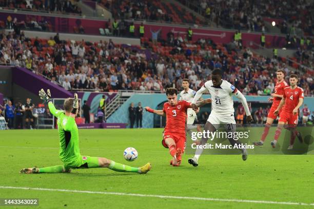 Tim Weah of USA scores his team's first goal past Wayne Hennessey of Wales during the FIFA World Cup Qatar 2022 Group B match between USA and Wales...