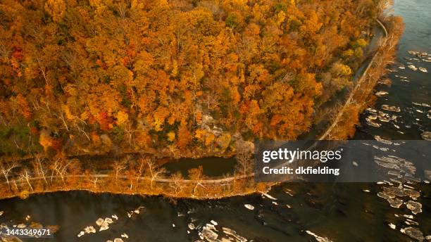 aerial view of the potomac river and c&o canal at sunset dusk in maryland - potomac maryland stock pictures, royalty-free photos & images