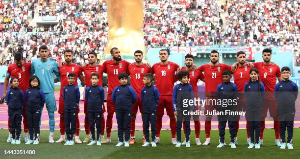 Iran players line up for the national anthem prior to the FIFA World Cup Qatar 2022 Group B match between England and IR Iran at Khalifa...