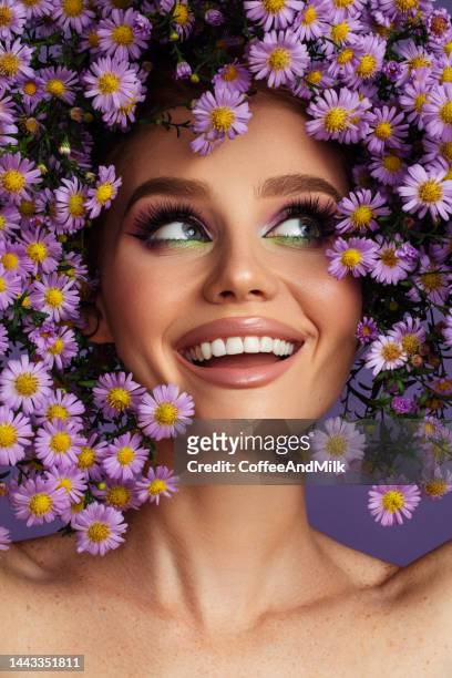 young beautiful girl with wreath of flowers on her head - beautiful woman spring stock pictures, royalty-free photos & images
