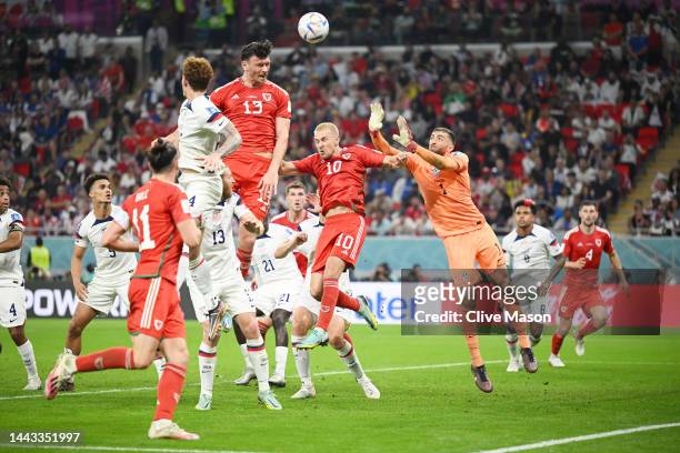 Kieffer Moore of Wales heads the ball towards goal during the FIFA World Cup Qatar 2022 Group B match between USA and Wales at Ahmad Bin Ali Stadium...