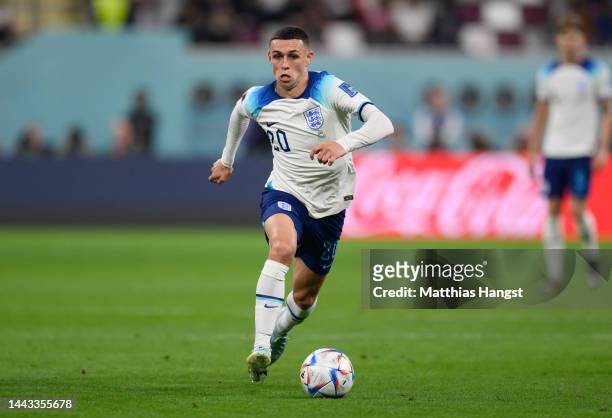 Phil Foden of England controls the ball during the FIFA World Cup Qatar 2022 Group B match between England and IR Iran at Khalifa International...