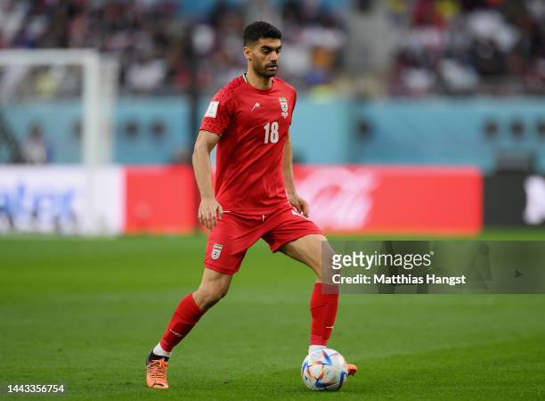 Ali Karimi of IR Iran controls the ball during the FIFA World Cup Qatar 2022 Group B match between England and IR Iran at Khalifa International...