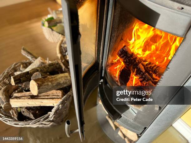 wood burning stove - wood burning stove stock-fotos und bilder