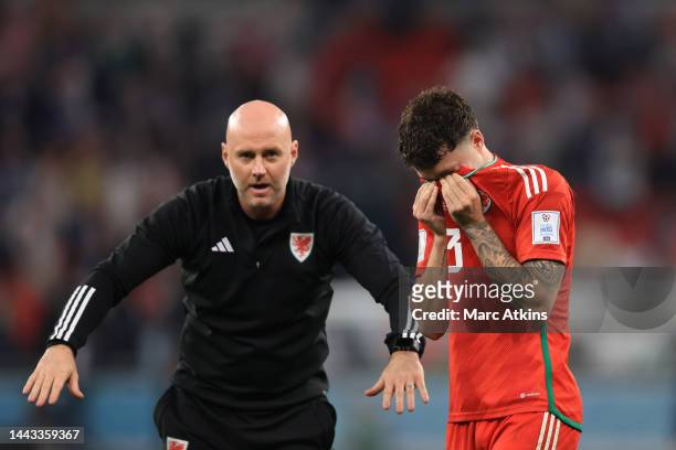Neco Williams of Wales is seen to be emotional after his team's result in the FIFA World Cup Qatar 2022 Group B match between USA and Wales at Ahmad...