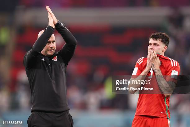 Rob Page, Head Coach of Wales, applauds fans while Neco Williams of Wales shows emotion after the 1-1 draw in the FIFA World Cup Qatar 2022 Group B...