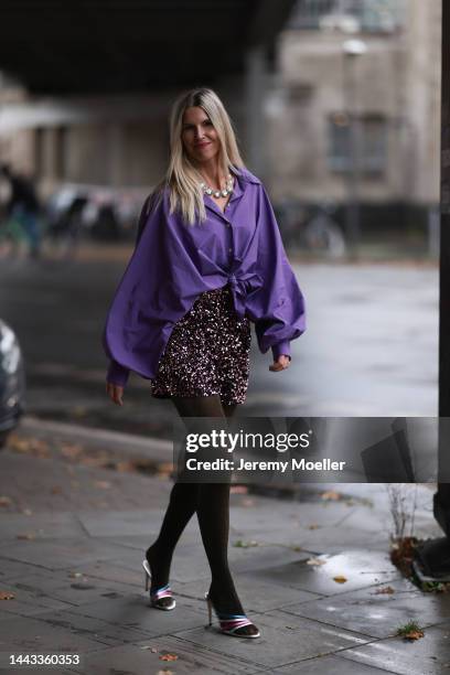 Vanessa Giers seen wearing SoSUE dark purple Antonia blouse, Zara glitter shiny shorts, Zara silver heels, Zaraon sparkling shiny tights November 17,...