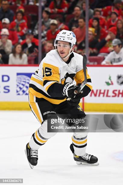 Josh Archibald of the Pittsburgh Penguins skates against the Chicago Blackhawks on November 20, 2022 at United Center in Chicago, Illinois.