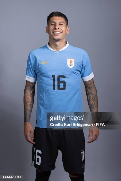 Mathias Olivera of Uruguay poses during the official FIFA World Cup Qatar 2022 portrait session on November 21, 2022 in Doha, Qatar.