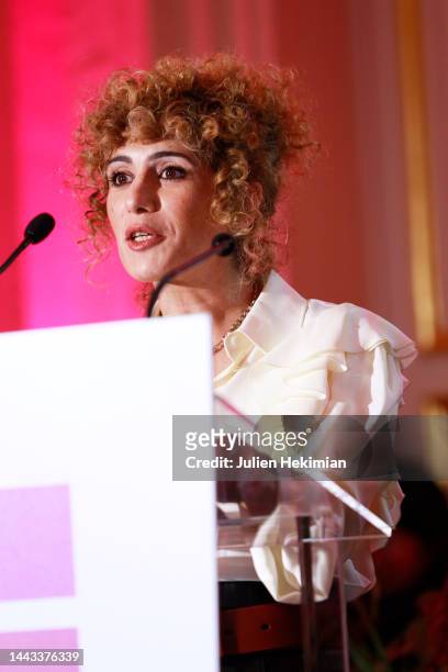 Abnousse Shalmani, who received the Woman of Cultural Influence Award, speaks during the "Prix De La Femme D'Influence" Award Ceremony at Palais...