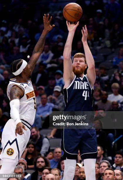 Davis Bertans of the Dallas Mavericks shoots the ball against the Denver Nuggets in the second half at American Airlines Center on November 20, 2022...