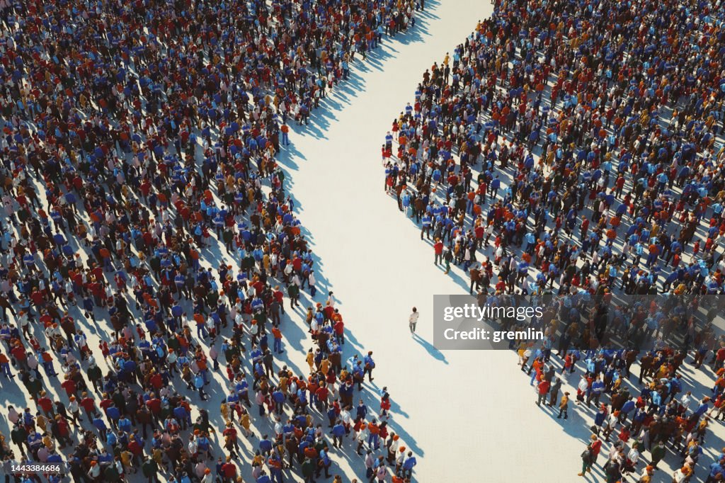 Man walking in crowds of people