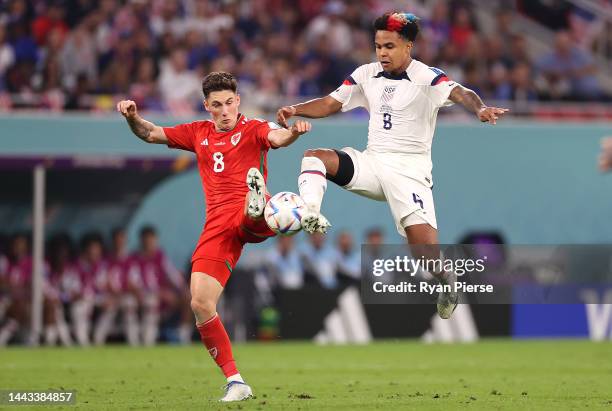 Harry Wilson of Wales battles for possession with Weston McKennie of United States during the FIFA World Cup Qatar 2022 Group B match between USA and...