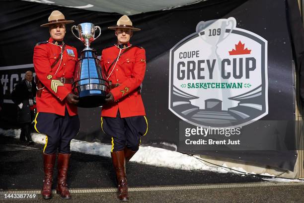 The Grey Cup is brought on to the field by two Royal Canadian Mounted Police officers before the 109th Grey Cup game between the Toronto Argonauts...
