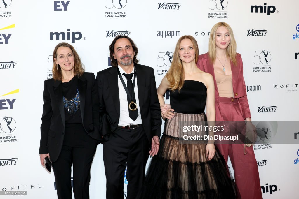 Hubert Besson and Maïdi Roth pose with guests at the 50th... News Photo ...