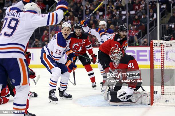 Jesse Puljujarvi of the Edmonton Oilers celebrates after scoring during the 1st period of the game against goaltender Vitek Vanecek and the New...