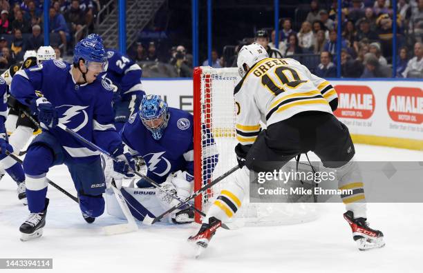 Andrei Vasilevskiy of the Tampa Bay Lightning stops a shot from A.J. Greer of the Boston Bruins during a game at Amalie Arena on November 21, 2022 in...