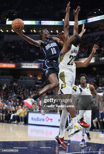 Bol Bol of the Orlando Magic shoots the ball against the Indiana Pacers at Gainbridge Fieldhouse on November 21, 2022 in Indianapolis, Indiana. NOTE...