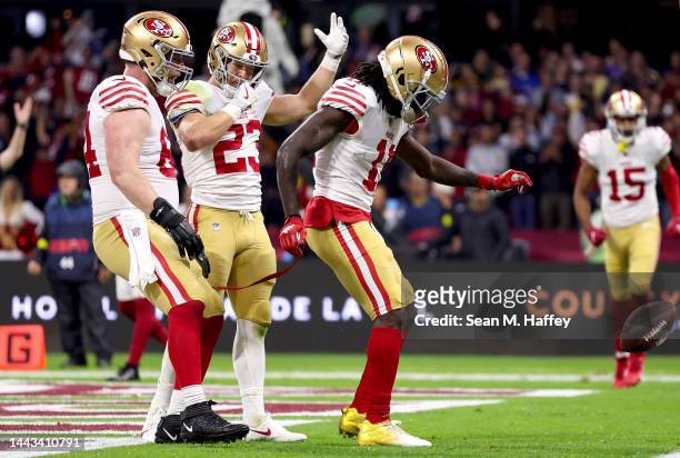 Brandon Aiyuk of the San Francisco 49ers celebrates with teammates after catching a touchdown pass against the Arizona Cardinals during the second...