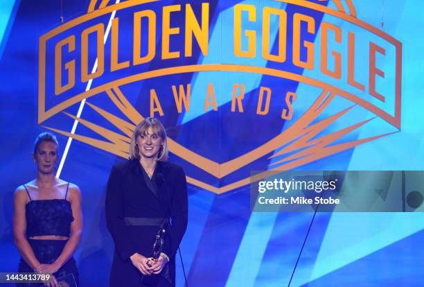 Swimmer Katie Ledecky speaks after receiving the Female Race of the Year award during the 2022 Golden Goggle Awards at the at the Marriott Marquis on...