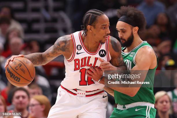 DeMar DeRozan of the Chicago Bulls drives to the basket against Derrick White of the Boston Celtics during the first half at United Center on...