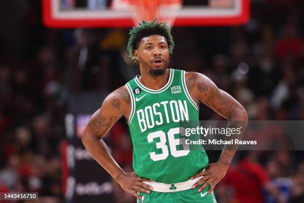Marcus Smart of the Boston Celtics looks on against the Chicago Bulls during the first half at United Center on November 21, 2022 in Chicago,...