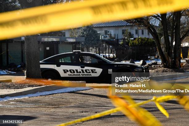 Police crime tape is still surrounding the scene of the shooting outside of Club Q on November 21, 2022 in Colorado Springs, Colorado. An attacker...