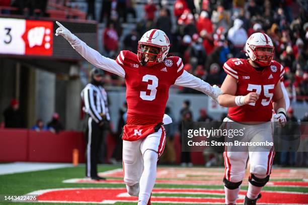 Wide receiver Trey Palmer of the Nebraska Cornhuskers celebrates a score with offensive lineman Trent Hixson against the Wisconsin Badgers during the...