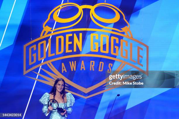 Swimmer Leah Smith speaks after receiving the Perseverance award during the 2022 Golden Goggle Awards at the Marriott Marquis on November 21, 2022 in...