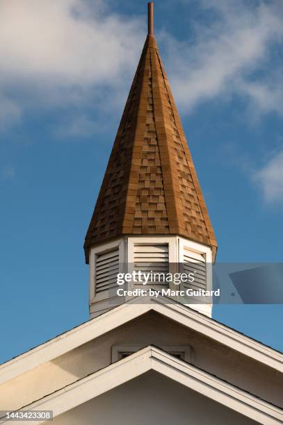 closeup of a church steeple in george town, grand cayman, cayman islands - steeple stock pictures, royalty-free photos & images