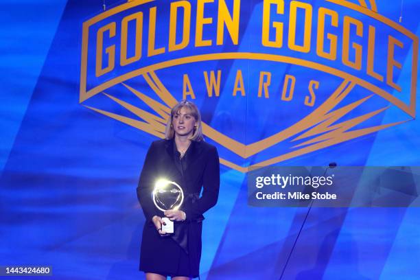 Swimmer Katie Ledecky speaks after receiving the Female Athlete of the Year award during the 2022 Golden Goggle Awards at the Marriott Marquis on...