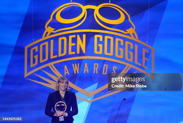 Swimmer Katie Ledecky speaks after receiving the Female Athlete of the Year award during the 2022 Golden Goggle Awards at the Marriott Marquis on...