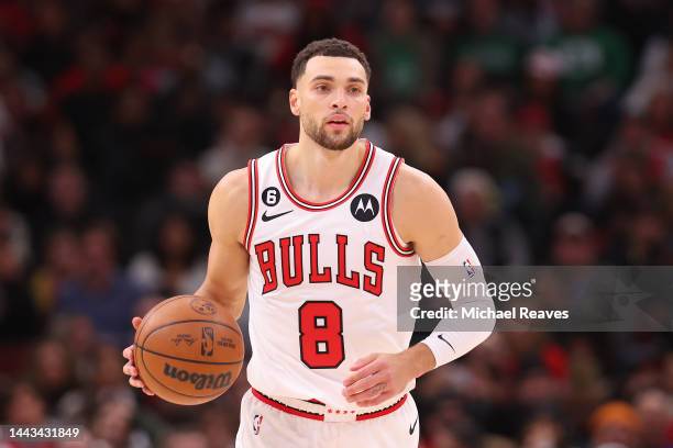 Zach LaVine of the Chicago Bulls dribbles up the court against the Boston Celtics during the second half at United Center on November 21, 2022 in...