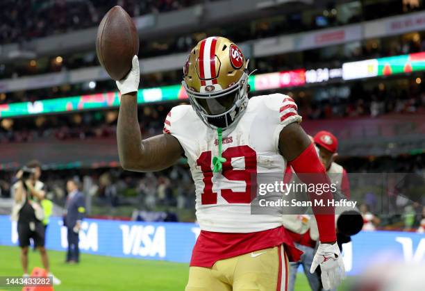 Deebo Samuel of the San Francisco 49ers celebrates after rushing for a touchdown against the Arizona Cardinals during the third quarter at Estadio...