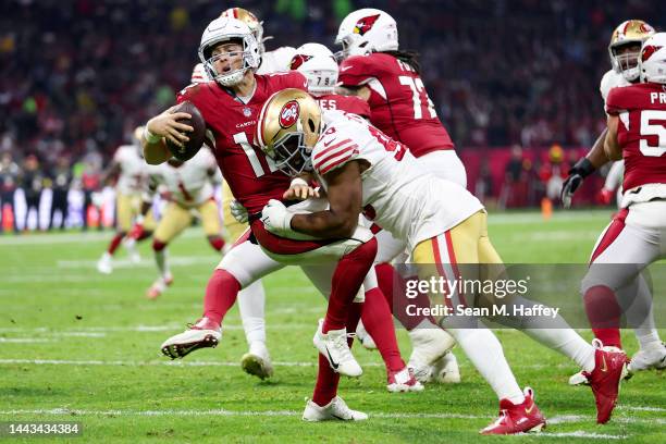 Kevin Givens of the San Francisco 49ers sacks Colt McCoy of the Arizona Cardinals during the third quarter at Estadio Azteca on November 21, 2022 in...