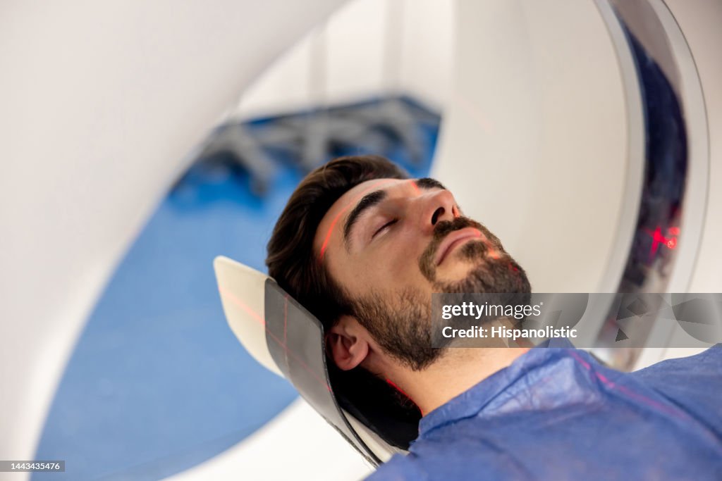 Getting Mri Scan Patient Getting An Mri Scan At The Hospital High-Res Stock Photo ...