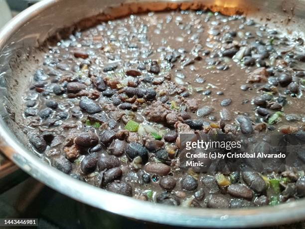 pan with black beans - black beans stock pictures, royalty-free photos & images