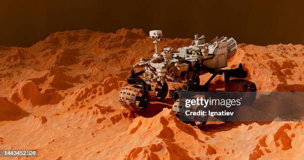 mars rover on a planet surface - space exploration stock pictures, royalty-free photos & images