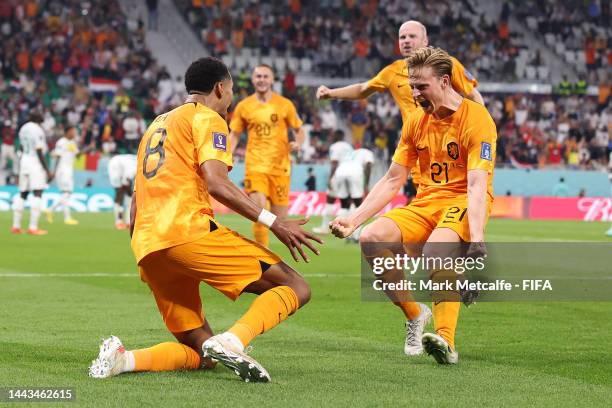 Cody Gakpo of Netherlands celebrates with Frenkie de Jong after scoring their team's first goal during the FIFA World Cup Qatar 2022 Group A match...
