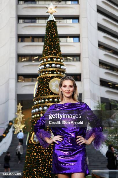 Media personality, Kate Waterhouse, lights up the inaugural Christmas tree at 25 Martin Place dressed in Party Season collection by just opened new...