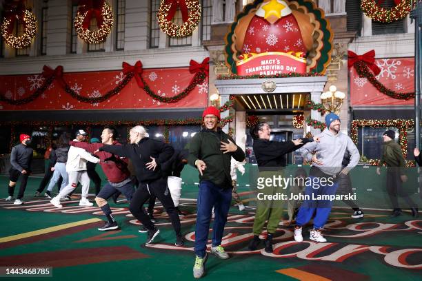Josh Dela Cruz and dancers perform during 96th Macy's Thanksgiving Day Parade rehearsals at Macy's Herald Square on November 21, 2022 in New York...