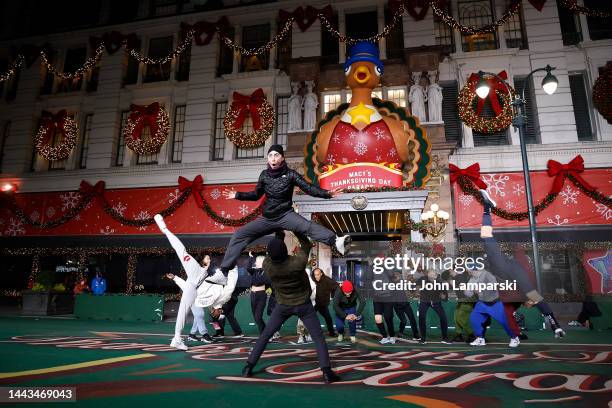 Josh Dela Cruz and dancers perform during 96th Macy's Thanksgiving Day Parade rehearsals at Macy's Herald Square on November 21, 2022 in New York...