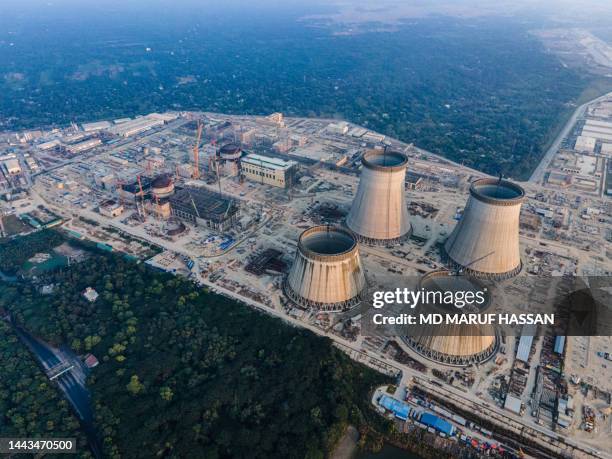 aerial view of underconstruction site of rooppur nuclear power plant - nuclear reactor stock pictures, royalty-free photos & images
